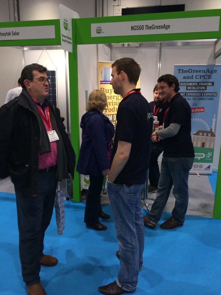 Nick Miles and Henry Campbell of TheGreenAge speaking to customers at Ecobuild 2014
